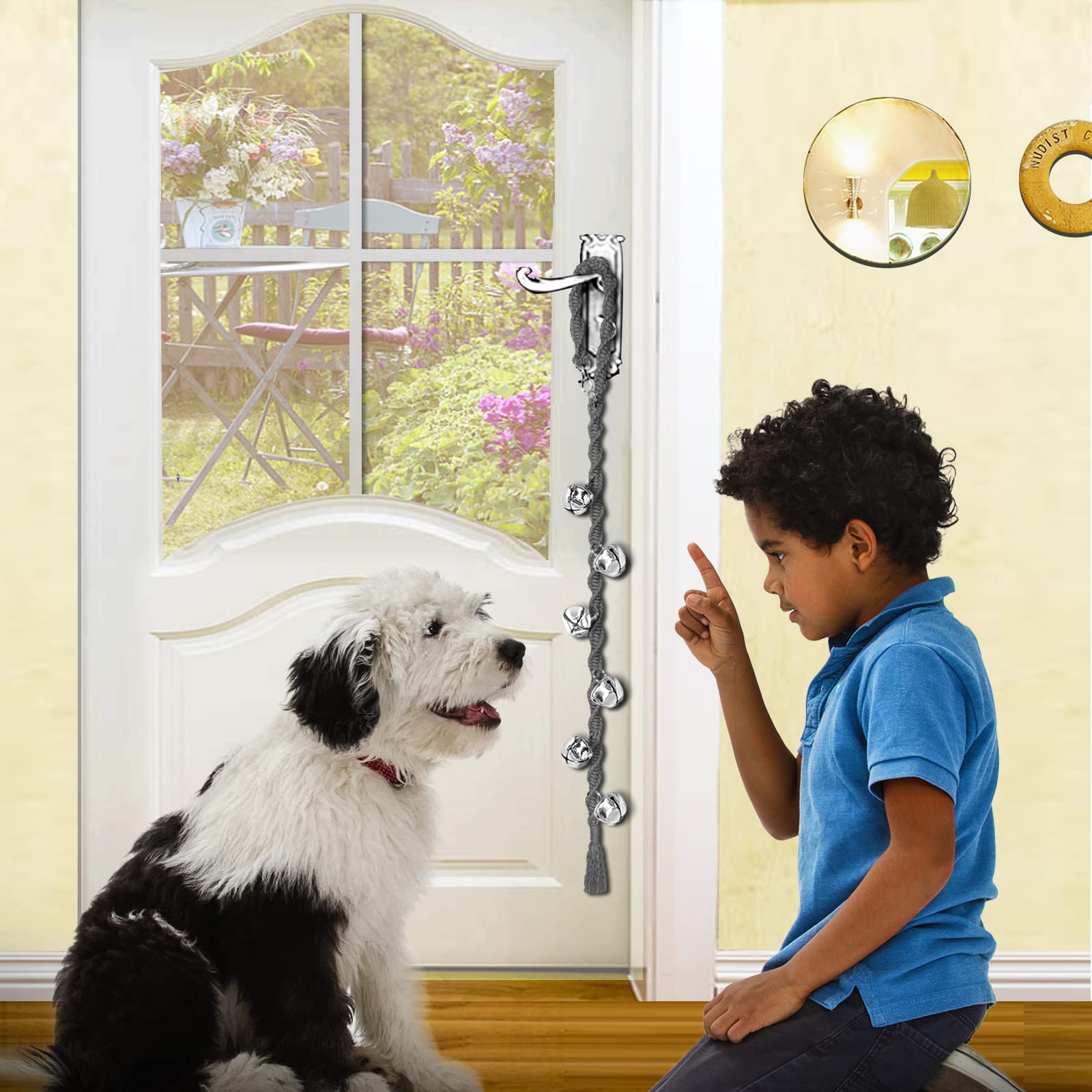Ginidear dog bells in use with a puppy for potty training