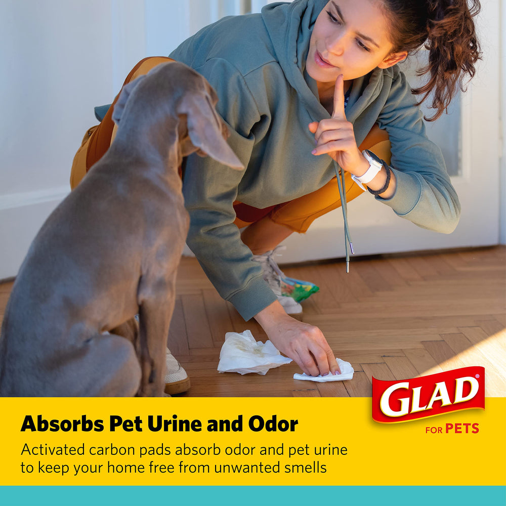 Glad for Pets charcoal puppy pad crate-training setup for indoor use.