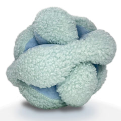 Glory To Dog Blue Snuffle Knot squeaker ball in use, engaging multiple senses.
