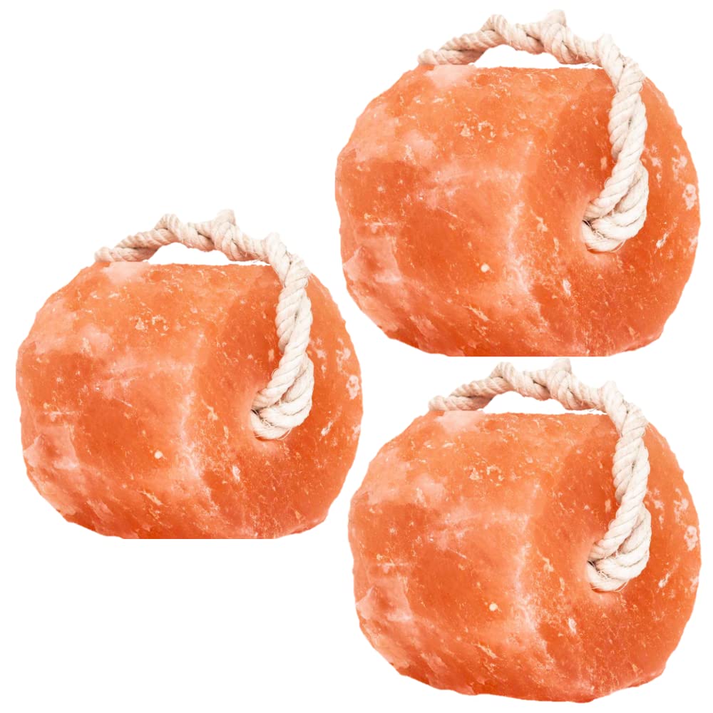 Glowyn Pink Himalayan salt lick pack on rope for livestock hydration and grazing.
