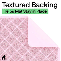 Textured backing helps keep the mat in place
