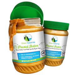 Creamy Green Coast Pet peanut butter on a spoon, a dog-friendly treat.
