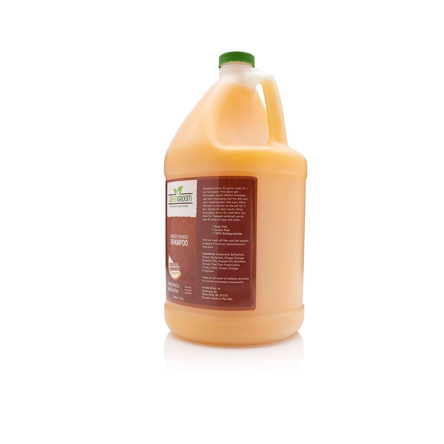 GreenGroom ginger-orange shampoo being poured for a gentle canine bath