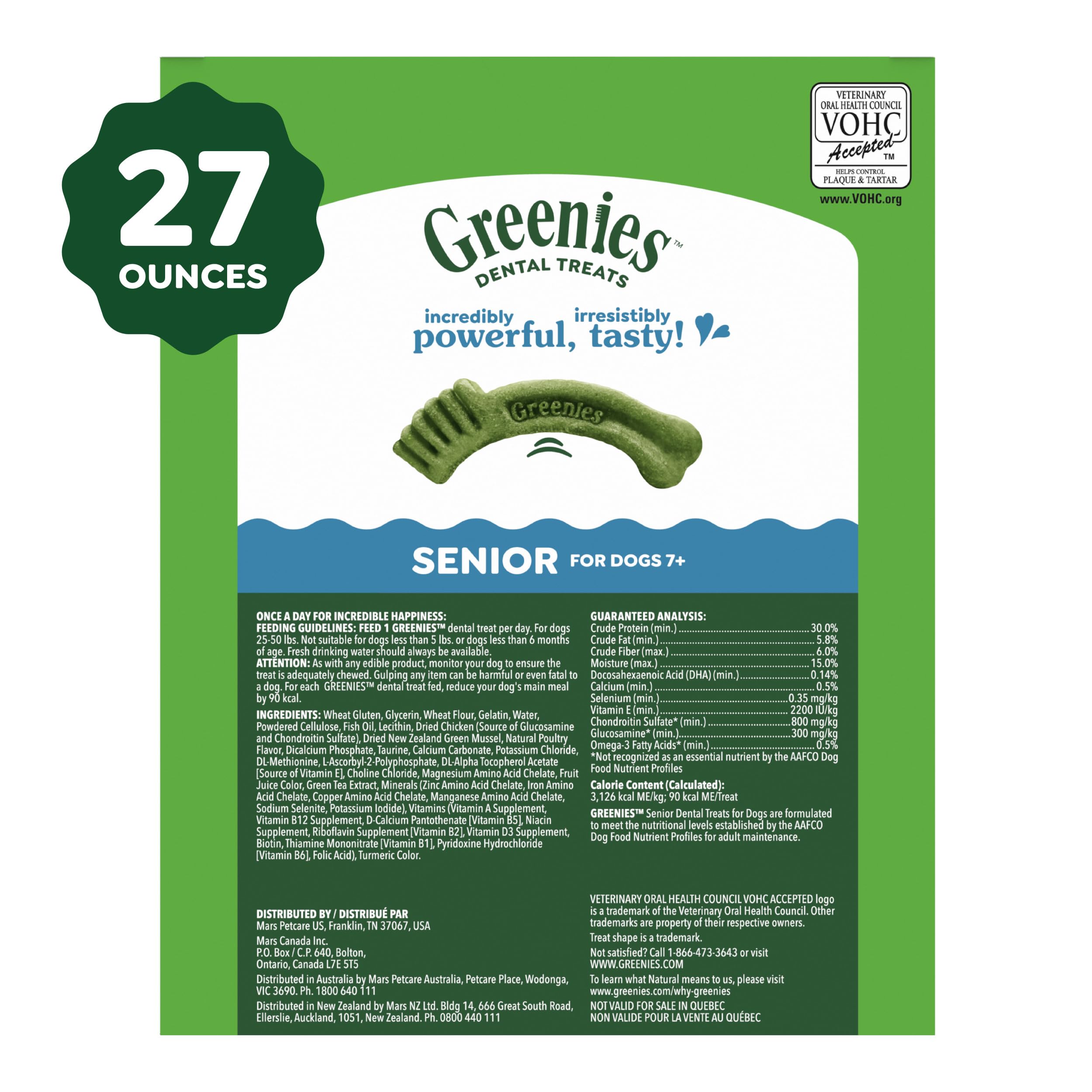 Senior dog happily chewing Greenies Aging Care treat