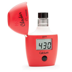 Hanna HI758 display highlights calcium levels in saltwater aquariums for stable coral environments.