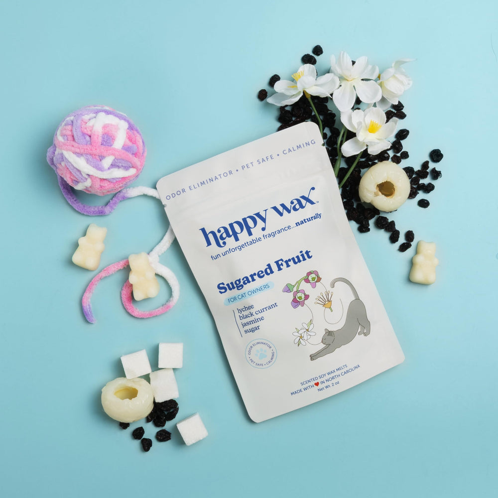 Happy Wax Teakwood Trails pet melts with woodsy notes for a clean feel