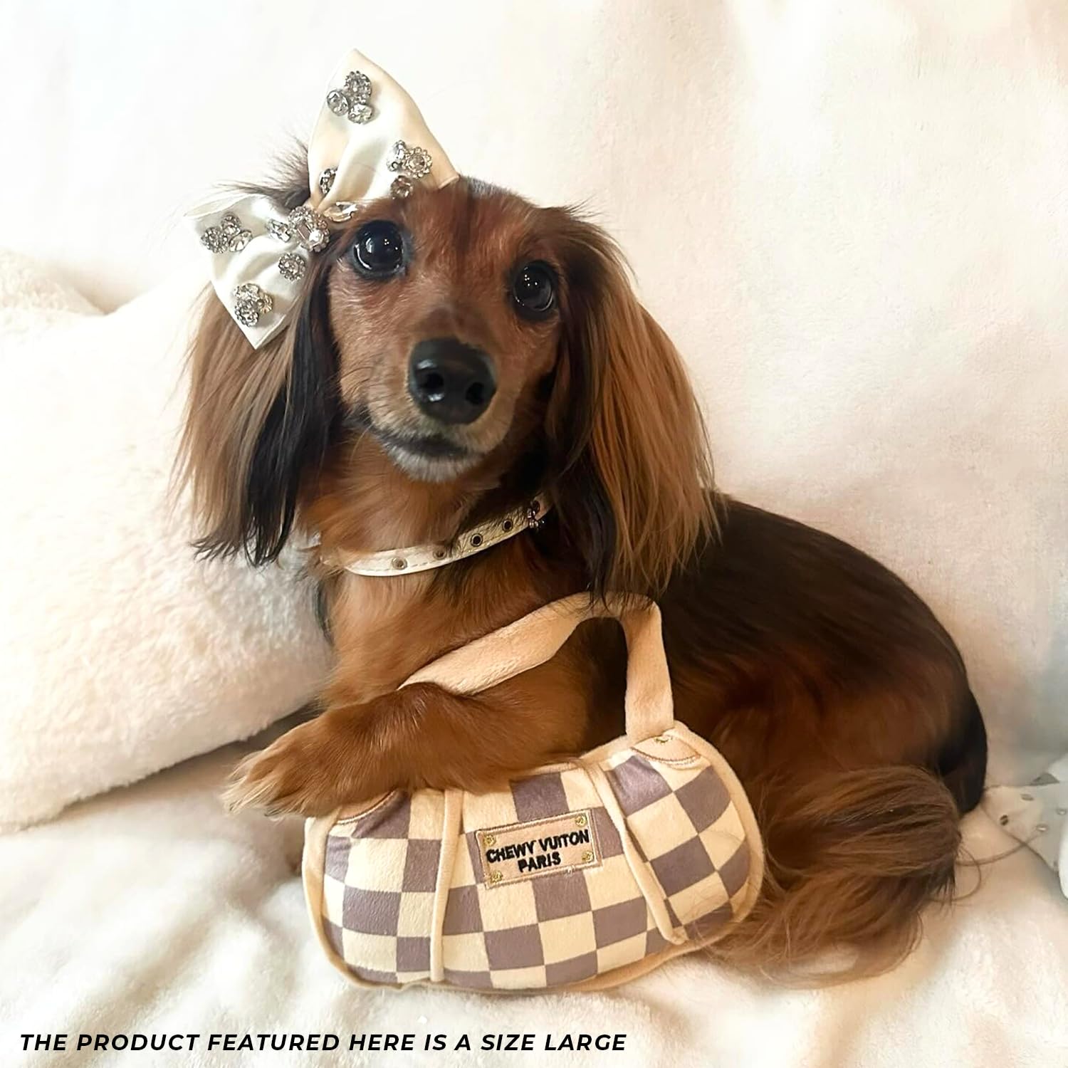 Haute Diggity Dog Chewy Vuiton Handbag-for-fetch adds action-packed play.
