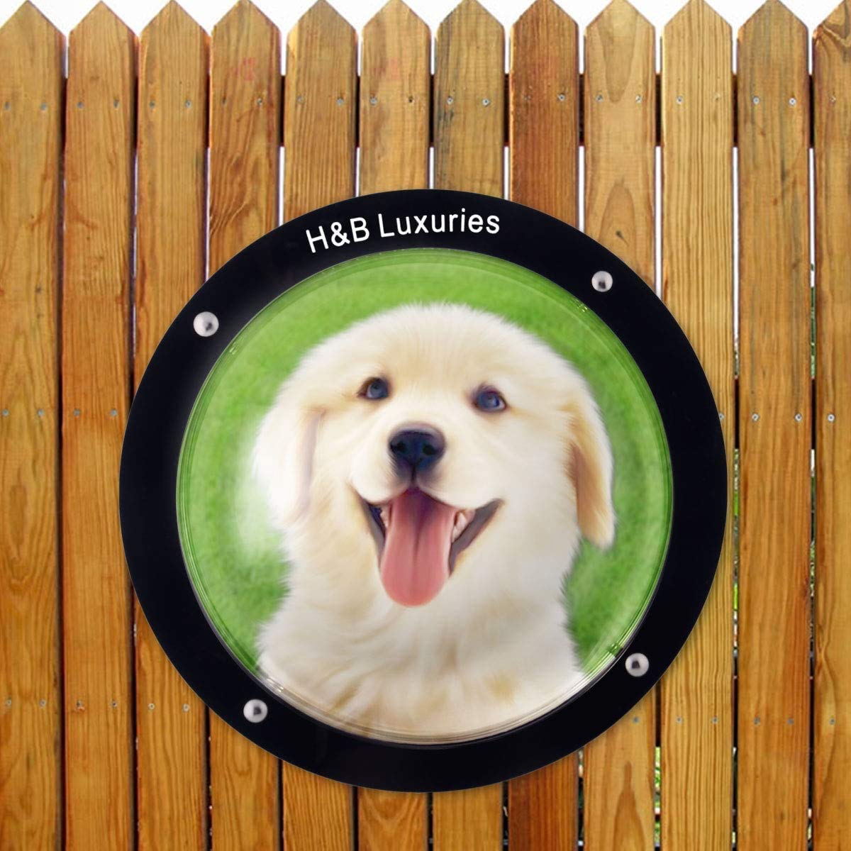 HB Luxuries dog window being installed on a wooden fence