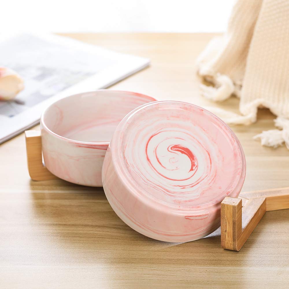 HCHLQLZ wood stand keeps bowls steady during playful feeding.