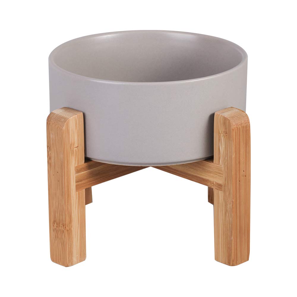 HCHLQLZ elevated ceramic cat bowl with wood stand, side view highlights spill-resistant design.