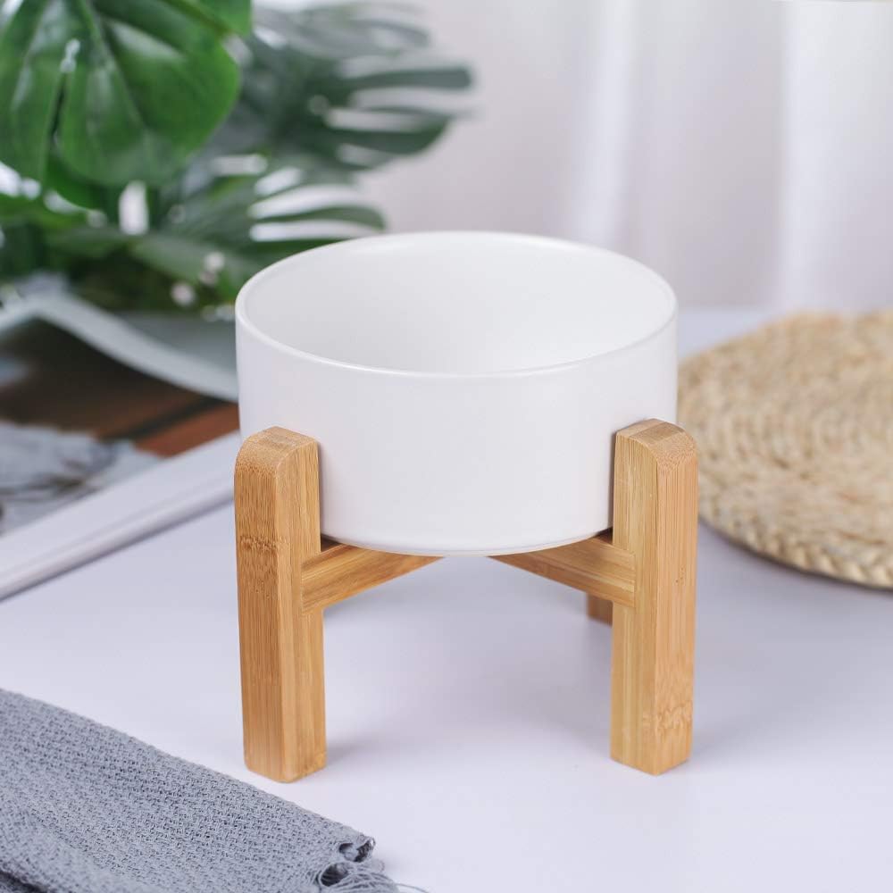 HCHLQLZ no-spill pet feeder with wood stand stays steady during meals