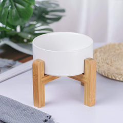 HCHLQLZ no-spill pet feeder with wood stand stays steady during meals