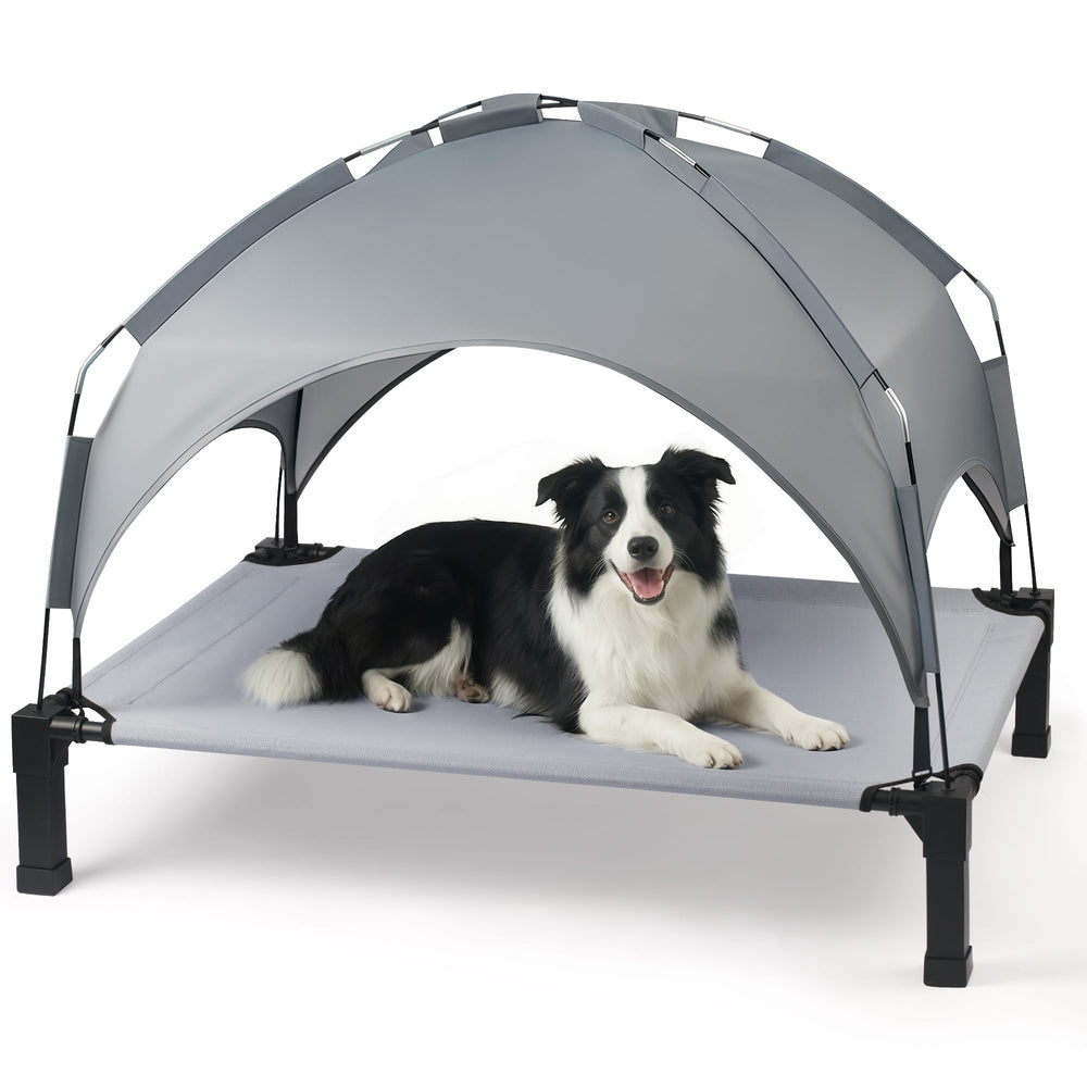 Heeyoo elevated dog bed with canopy provides shade for outdoor lounging.