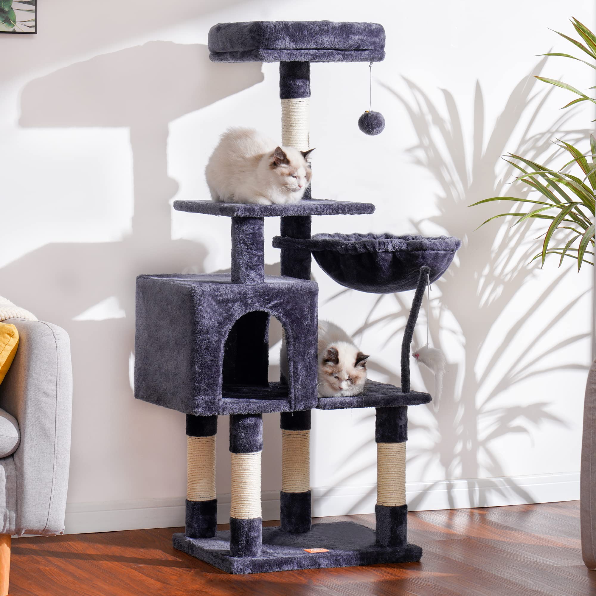 Heybly cat tree with sisal posts for scratching and furniture protection.