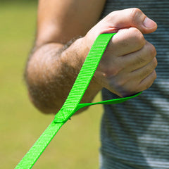 Hi Kiss recall-training-leash green during outdoor play for reliable recall.
