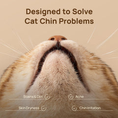 Finger sleeve on hand preparing to clean a cat's chin with HICC PET wipes