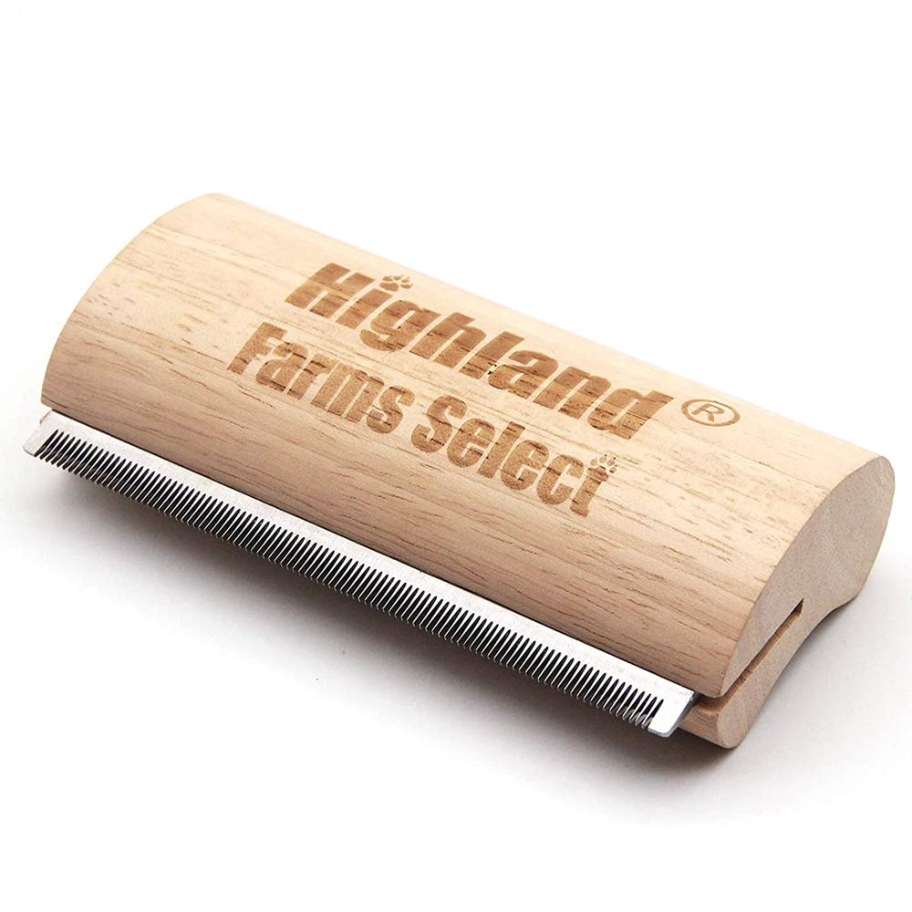 Highland Farms Select deshedding brush for dogs removes loose fur quickly.