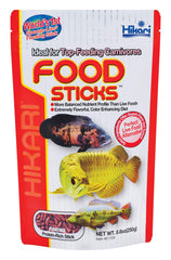 Hikari Tropical Food Sticks bottle showing vibrant color potential for carnivores.