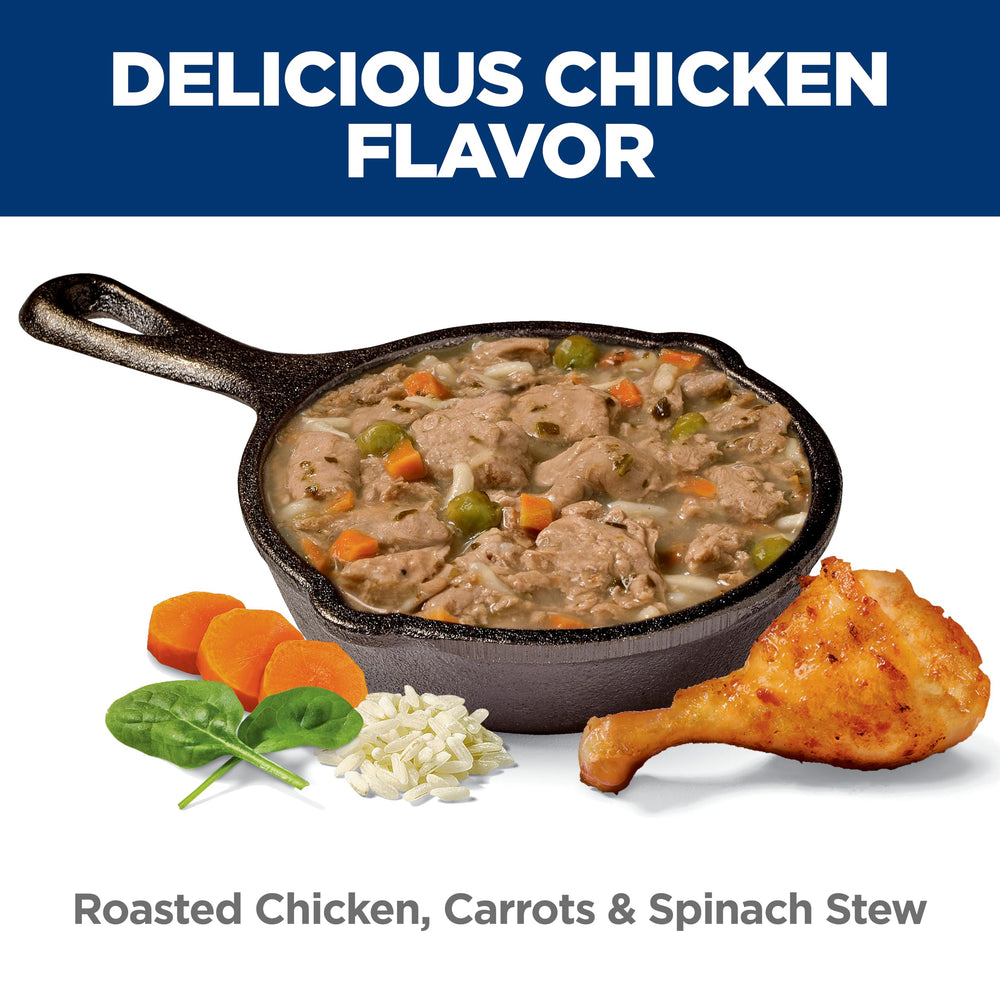 Hill's Science Diet open-can with spoon Roasted Chicken Stew suggests convenient mealtime feeding.