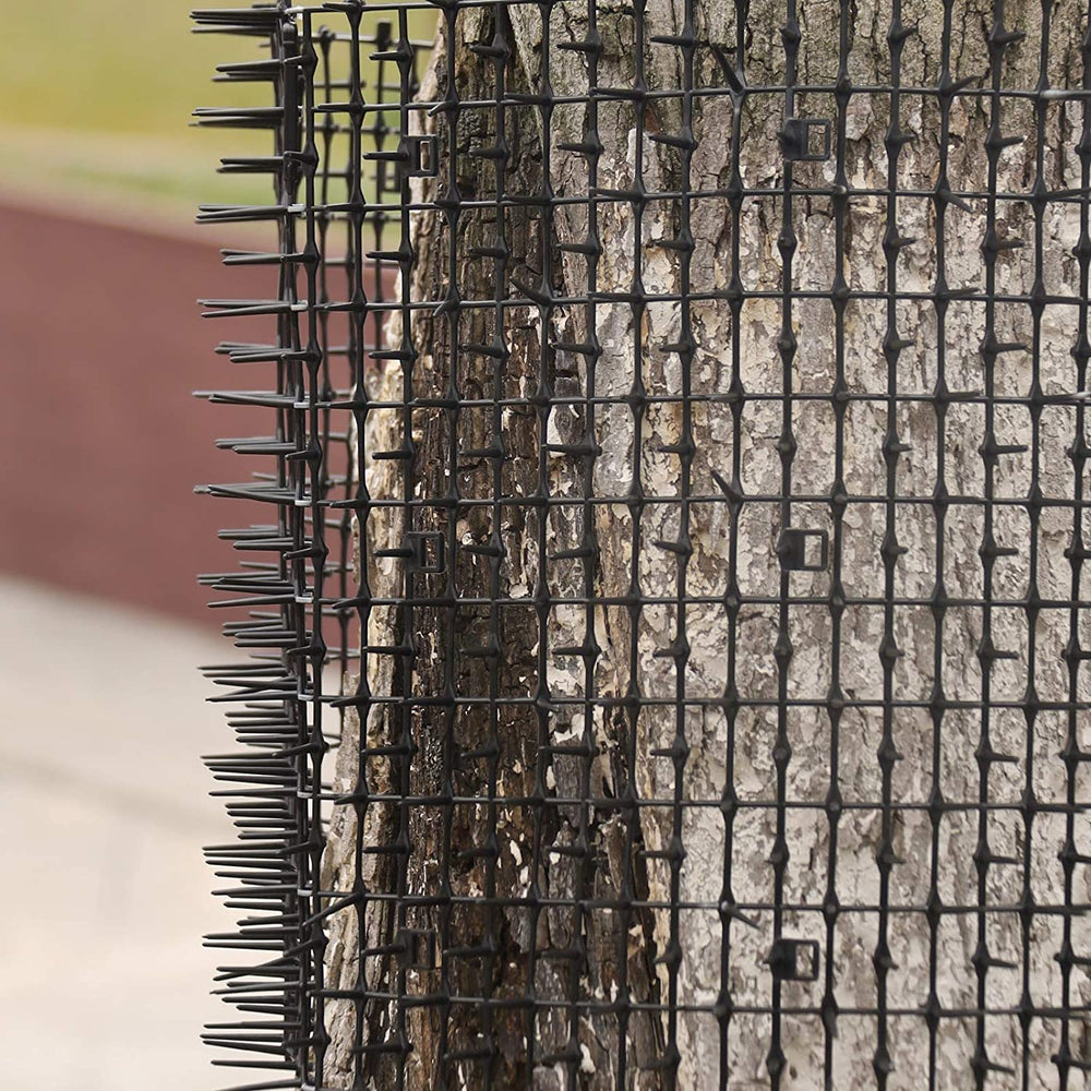 Hmdivor scat mat includes garden staples for secure anchoring.