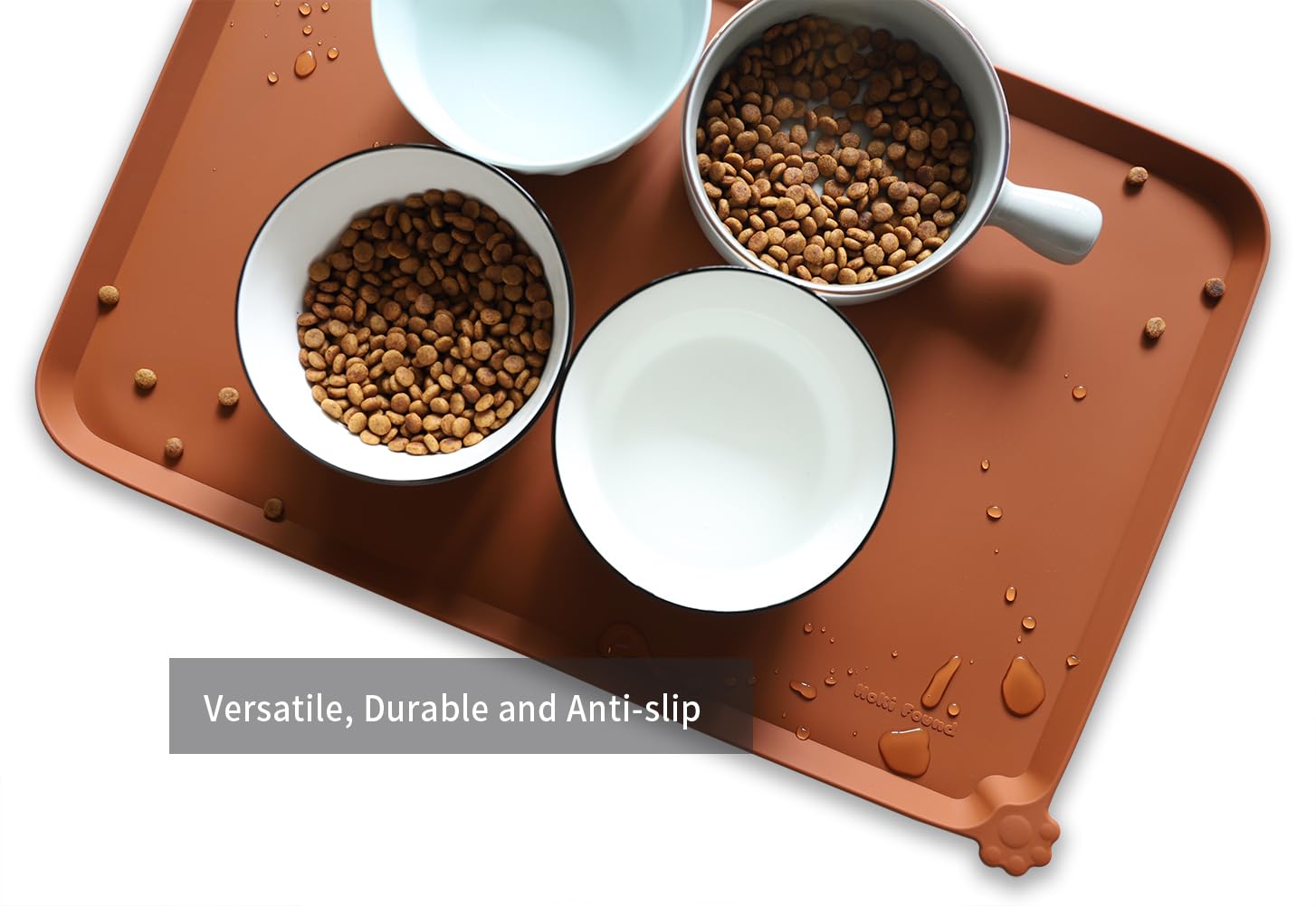 Hoki Found dishwasher-safe mat in caramel helps quick cleanup and travel use.