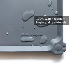 Hoki Found extra-high edge mat contains crumbs and water at feeding time