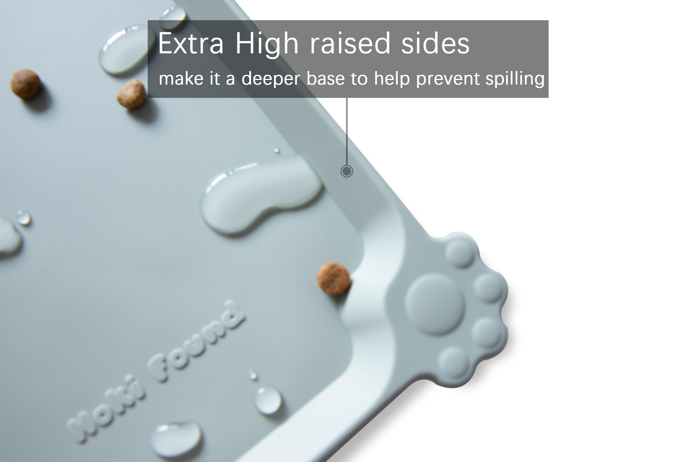 Hoki Found high-lip pet mat helps contain messes.