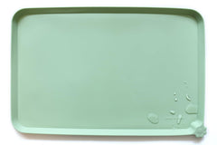 Hoki Found L silicone non-slip placemat keeps bowls steady and floors clean.