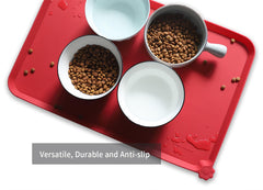 Hoki Found L silicone mat being wiped clean after meals for quick cleanup.
