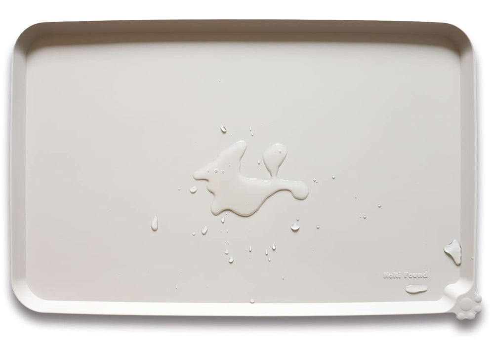 Hoki Found large silicone non-slip pet feeding mat in cream brown prevents spills and protects floors.