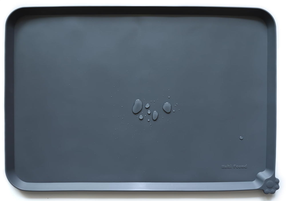 Hoki Found large gray silicone pet feeding tray for mess-free meals.