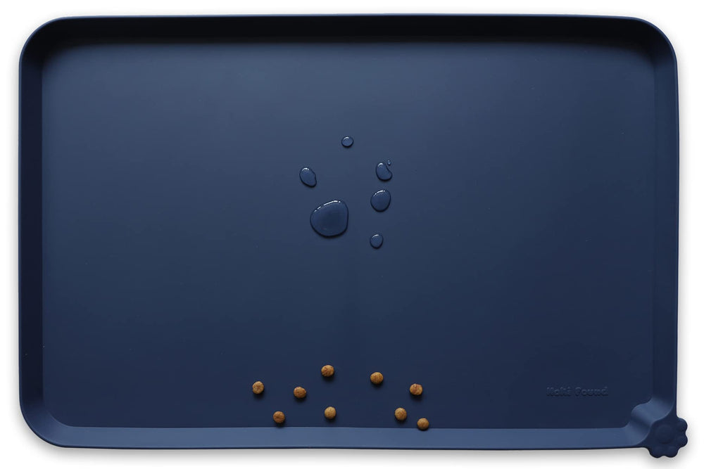 Hoki Found large waterproof silicone pet food mat tray keeps spills away from floors.
