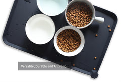 Hoki Found waterproof bowl mat protects flooring from spills and mess.