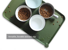 Hoki Found L dark olive mat protects floors and contains crumbs.