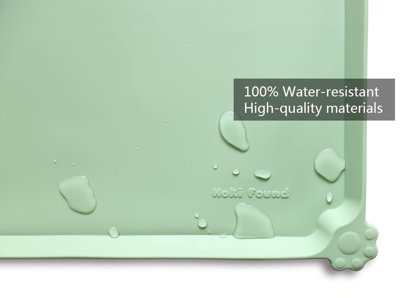 Hoki Found raised-edge mat protects floors from spills and drips