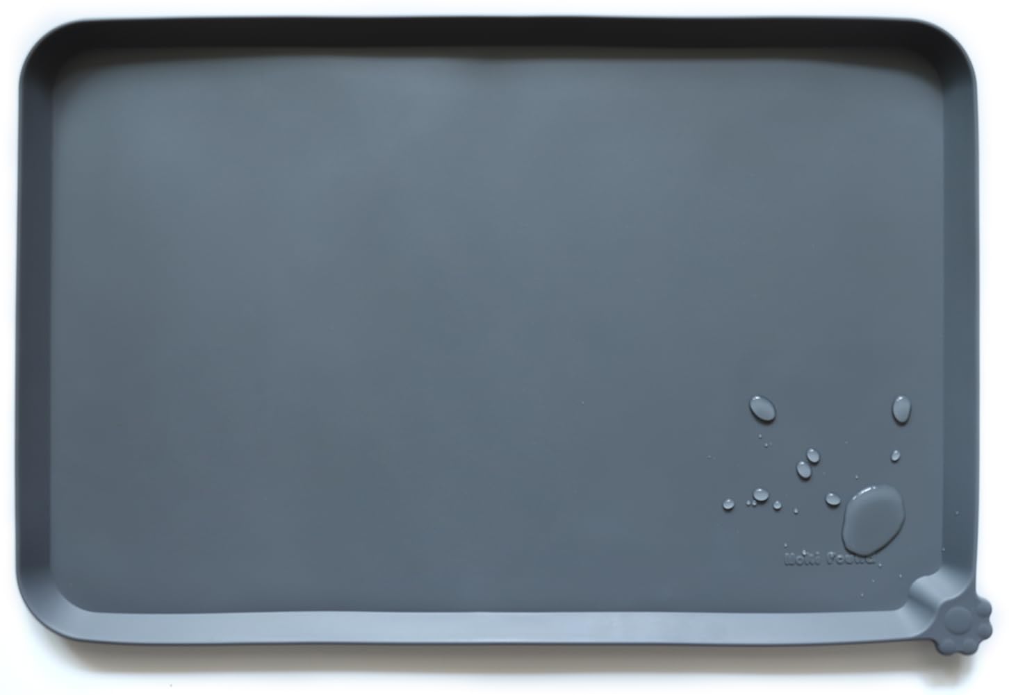 Hoki Found silicone pet food mat in gray with a non-slip surface for bowls.