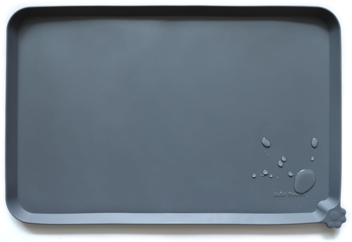 Hoki Found silicone pet food mat in gray with a non-slip surface for bowls.