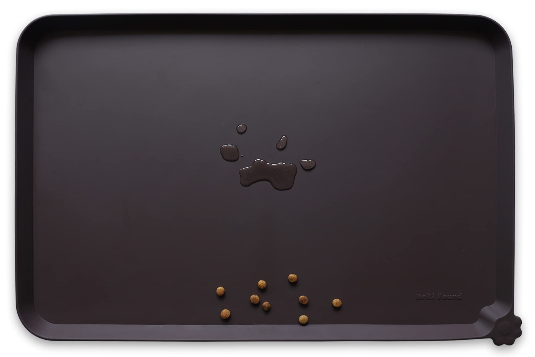 Hoki Found silicone pet food mat with high lip keeps spills away from floors.