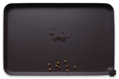 Hoki Found silicone pet food mat with high lip keeps spills away from floors.