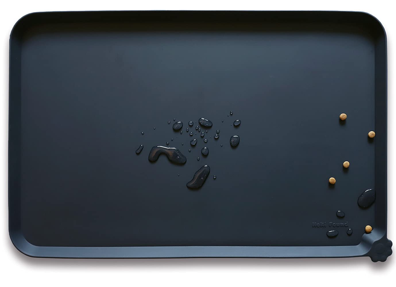 Hoki Found silicone pet food mat showing non-slip surface keeps bowls steady during meals.
