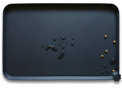 Hoki Found silicone pet food mat showing non-slip surface keeps bowls steady during meals.