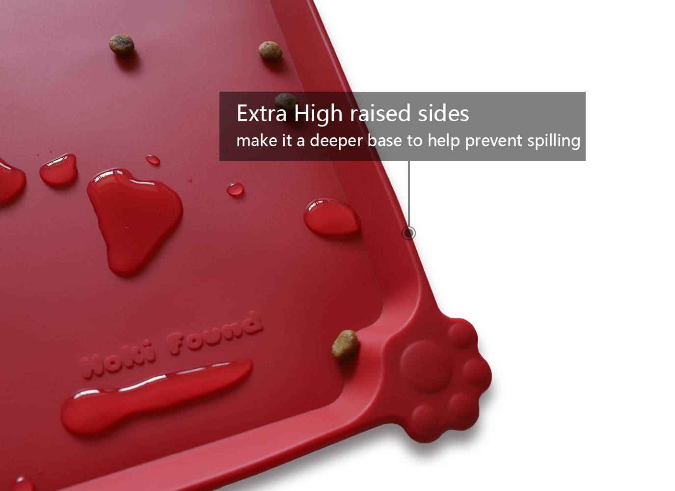 Hoki Found raised-edge mat prevents spills around bowls during feeding.