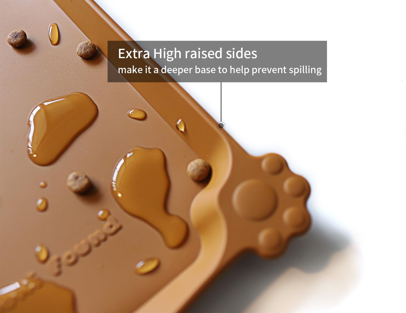 Raised-edge close-up on Hoki Found mat prevents spills during busy feeding.