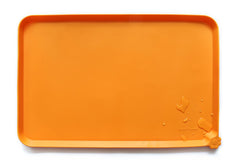Hoki Found silicone non-slip pet feeding mat in orange helps keep meals mess-free.