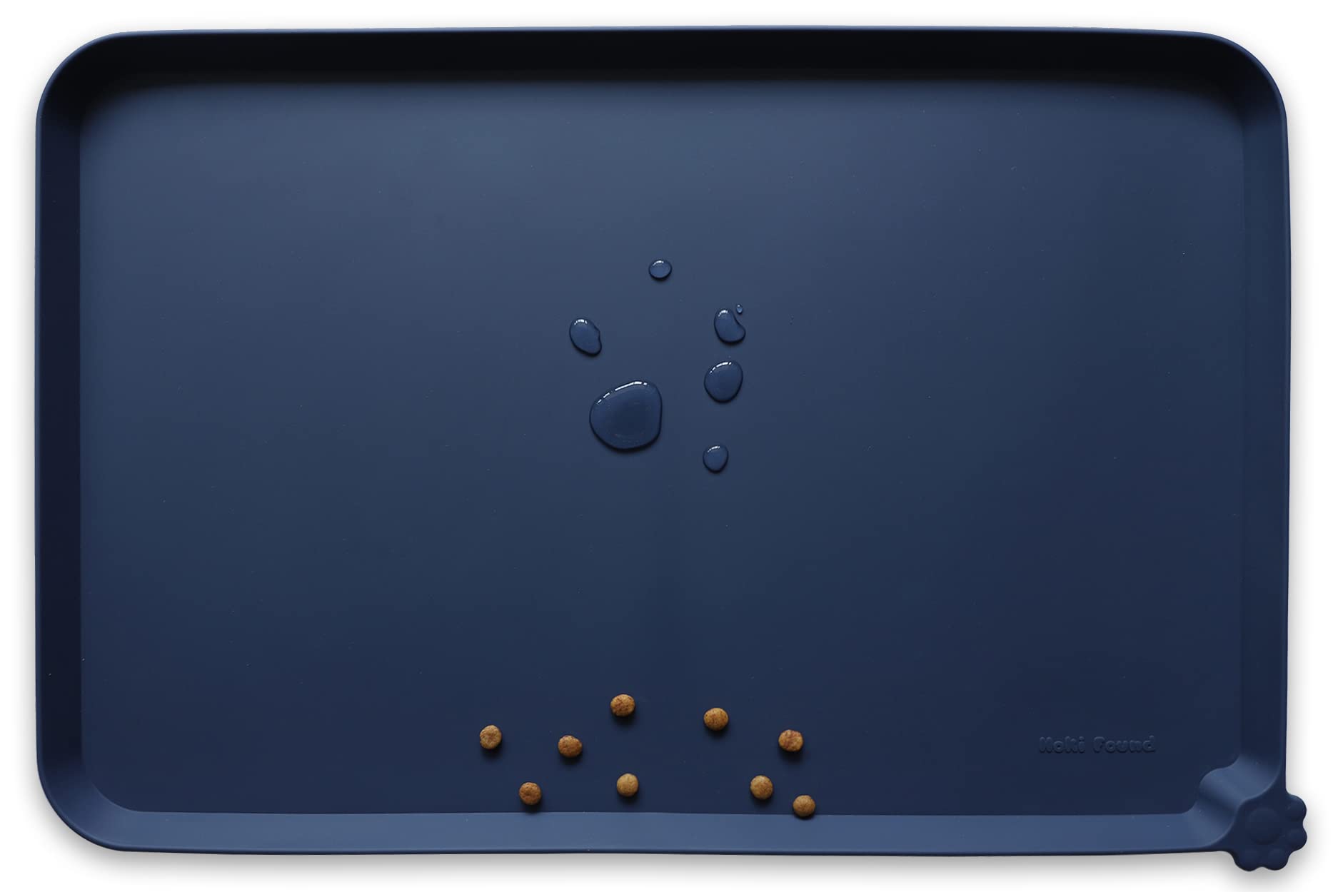 Hoki Found silicone pet food mat with high lips protects floors from spills.