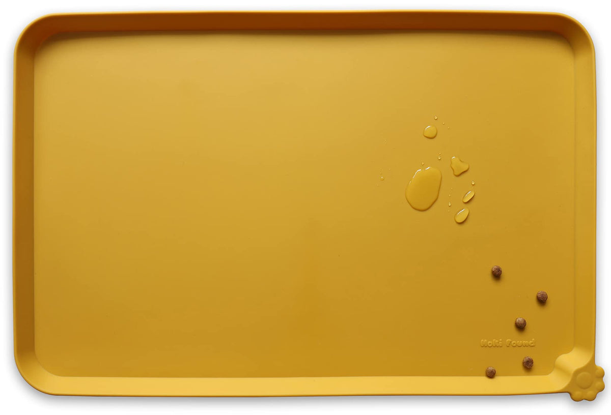 Hoki Found Honey mat top view with bowls helps contain spills.