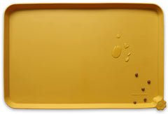 Hoki Found Honey mat top view with bowls helps contain spills.