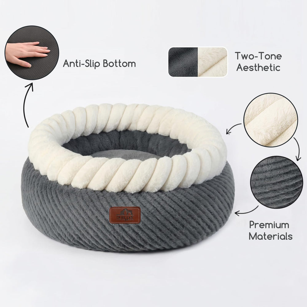 Hollypet bed fits cats up to 22 lbs and small dogs up to 16.5 lbs.