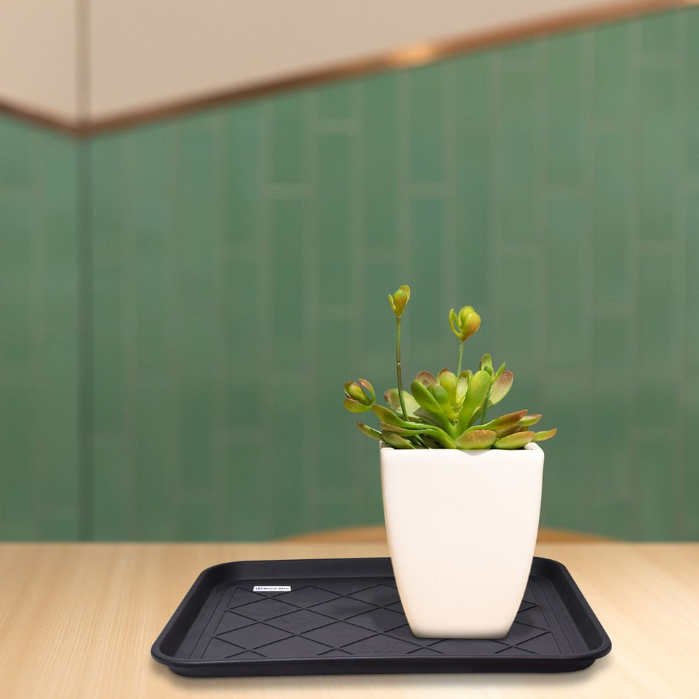 Home-Man all-weather tray guards floors indoors and outdoors from rain and dirt.