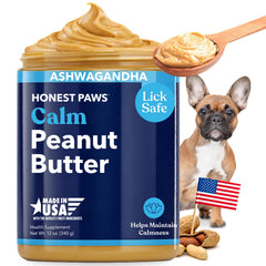 Honest Paws Calming Peanut Butter jar being spooned for calm moments at home.